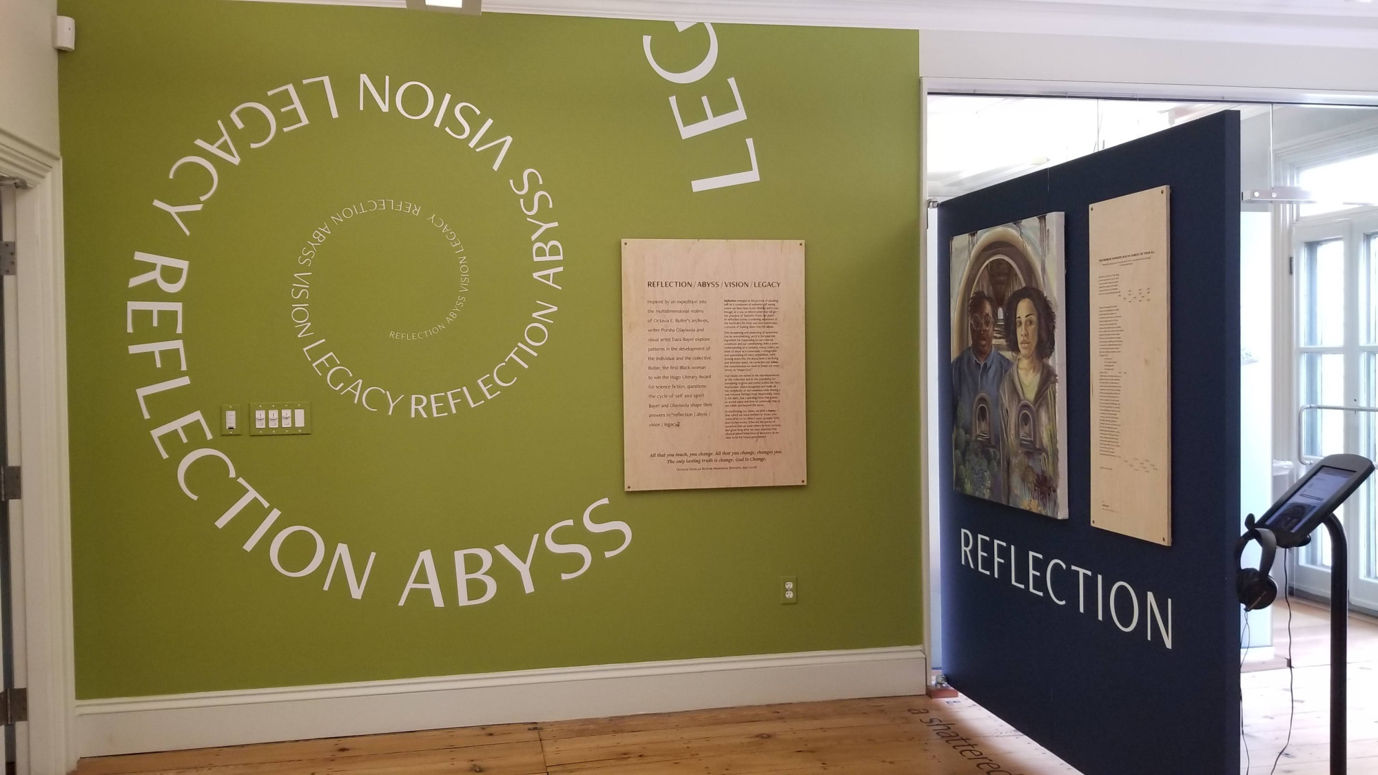 Picture of reflection/abyss/visiojn/legacy exhibition with spiral wall and reflection painting wall