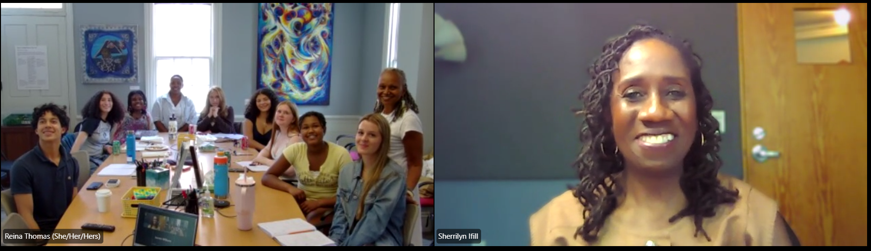 Screenshot of a zoom meeting between a large group and woman.