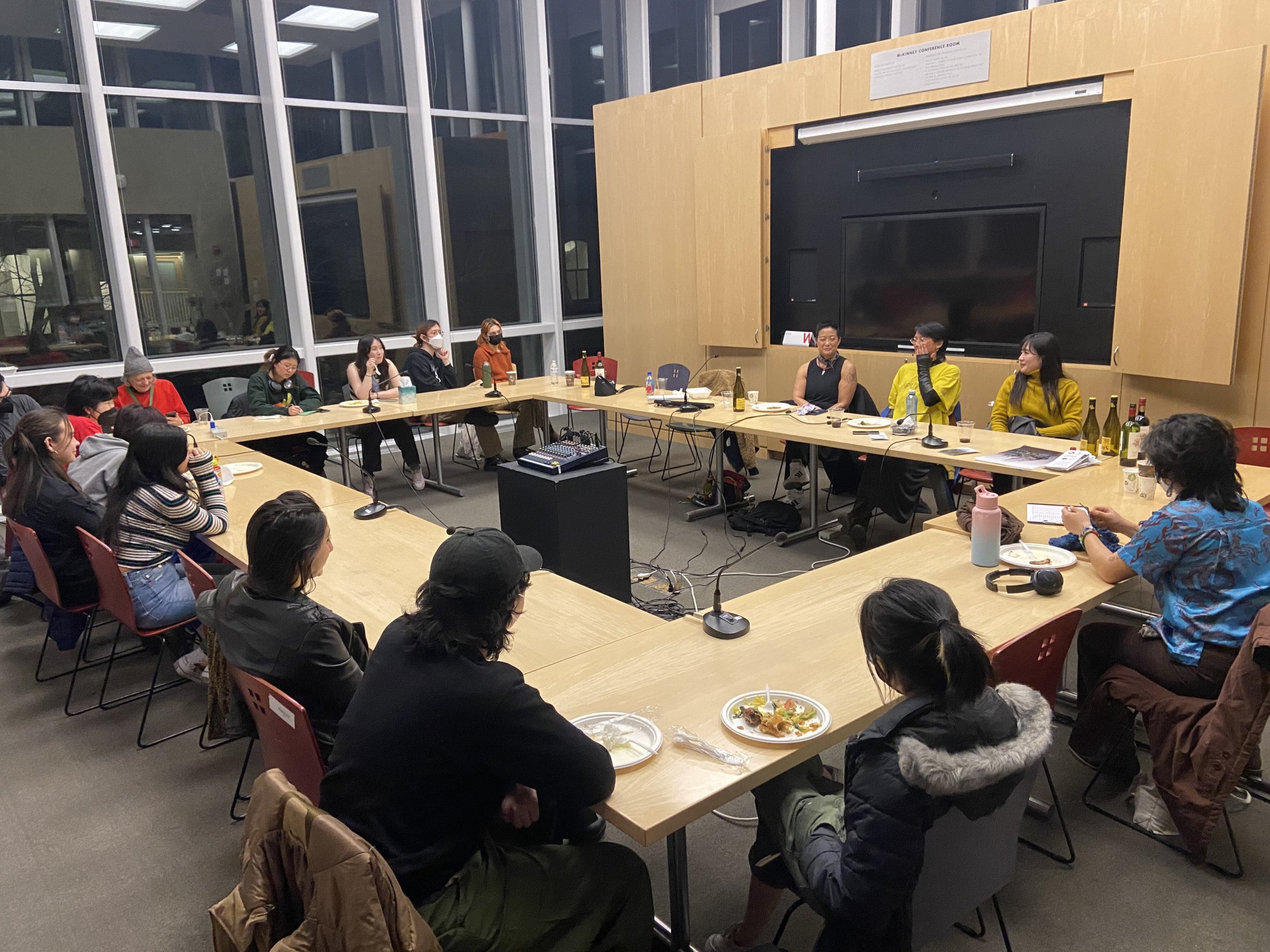 Members of research cluster watch "Fly in Power" in Spring 2023.