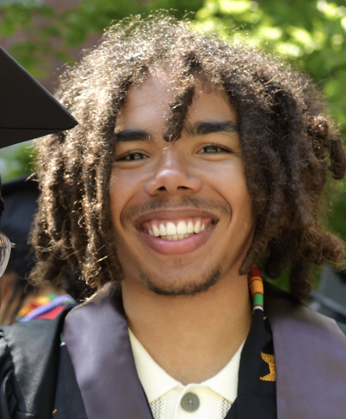 Gustav Hall pictured in a cap and gown.