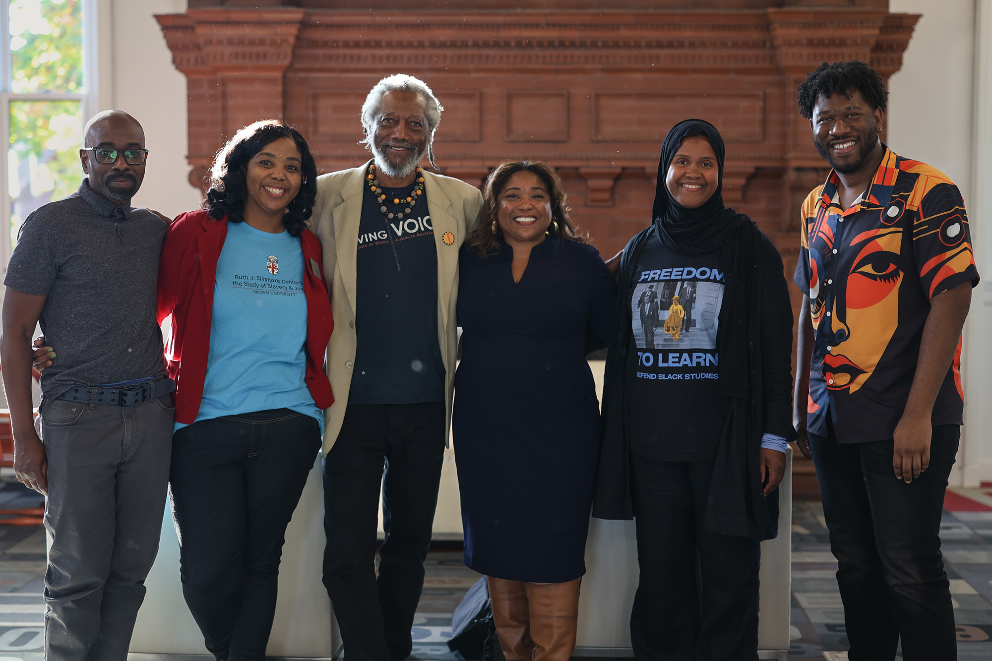 A group of people standing for a picture