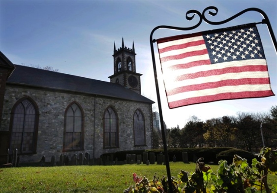 American flag outside cathedral